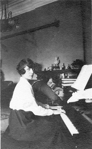 Doushka at the piano with Mimi